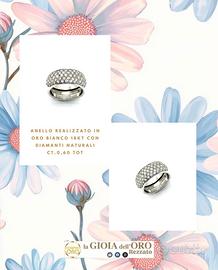 Anello fascia oro bianco e diamanti