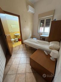 Stanza songola con Bagno in Camera