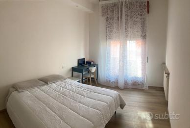 Camera singola con bagno privato e balcone
