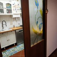 Porta scorrevole con vetro
