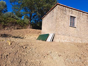 Terreno con deposito