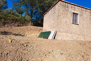 Terreno con deposito