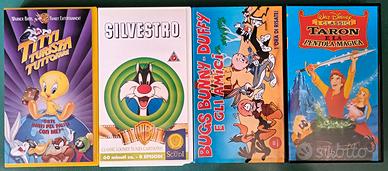 4 VHS con film di animazione Disney, WB e altro