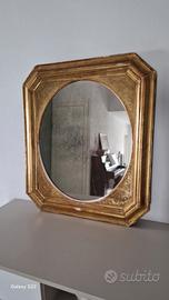 specchio antico ricoperto da foglia d'oro 