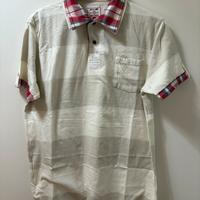 Polo a righe con dettagli tartan e grafica