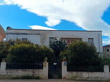 Abitazione con giardino e posto auto