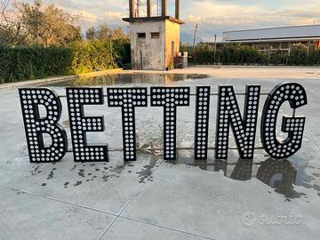 insegna a lettere scritta betting 95h 350L 10 prof