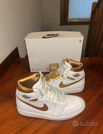 Jordan 1 retro high metallic gold