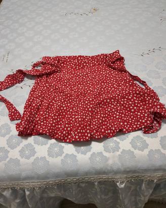 gonna con pantaloncino sotto e cinturina in vita