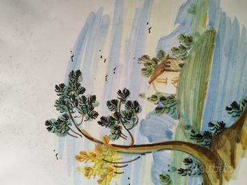 Antico piatto Castelli e firmato dall'artista