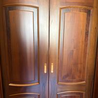 Porta doppia scorrevole in legno massello