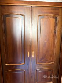 Porta doppia scorrevole in legno massello