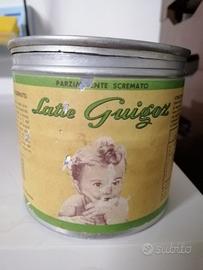 scatola latta Guigoz latte in polvere 