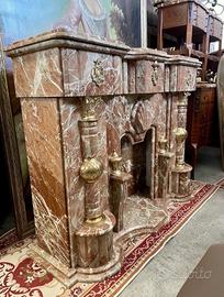 camino in marmo rosa breccia