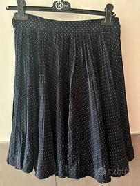 Gonna plissettata blu a pois bianchi