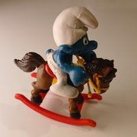 puffo cavallo a dondolo