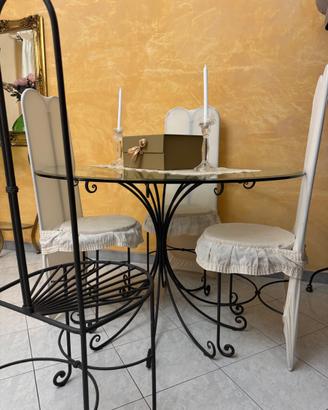 Tavolo in ferro battuto con piano in vetro +4sedie