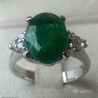 ANELLO ORO 18kt. DIAMANTI E SMERALDO OVALE