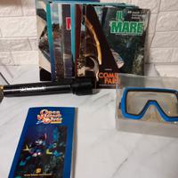 torcia sub mascheralibro raccolta sul mare