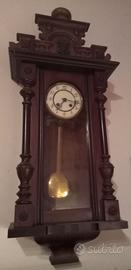 Orologio a pendolo a muro