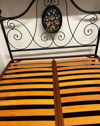 letto in ferro battuto con rete