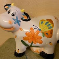 Salvadanaio in ceramica soggetto mucca