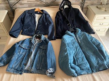 scatolone pieno di vestiti e scarpe