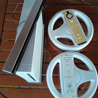 Wii + 2 telecomandi + 2 volanti+ giochi