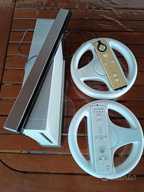 Wii + 2 telecomandi + 2 volanti+ giochi