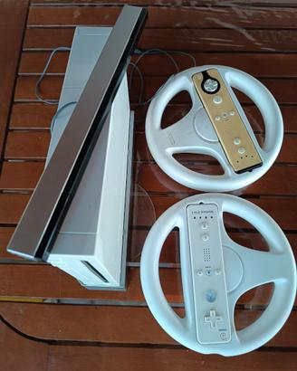 Wii + 2 telecomandi + 2 volanti+ giochi