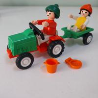 Playmobil bambini con trattore e rimorchio