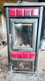 Royal, stufa a legna, ceramica, baita rossa