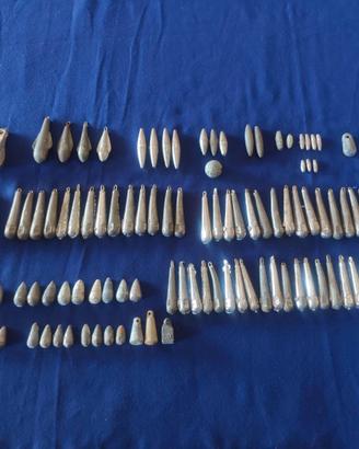 119 piombi da pesca di varie forme e peso