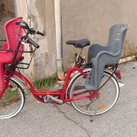 Bici con seggiolini