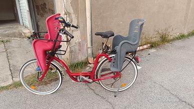 Bici con seggiolini