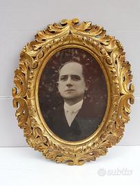 Cornice ovale dorata in legno e gesso meta' 900