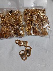 ganci per pellame dorati 