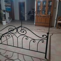 Letto in ferro battuto antico