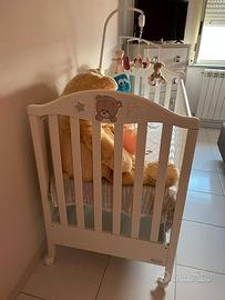 CULLA COMPLETA DI SET E GIOSTRINA MAI UTILIZZATA