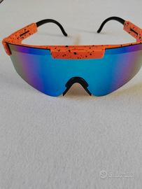 Occhiali sportivi arancione effetto splatter