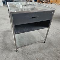 Tavolo espositore in vetro con cassetto