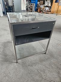 Tavolo espositore in vetro con cassetto