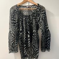 Blusa trasparente a pois