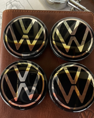 Set 4 Coprimozzi VW 56,5mm Golf Tiguan Passat Polo