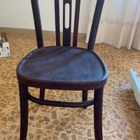 Sedia antica in legno curvato