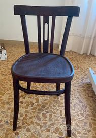 Sedia antica in legno curvato