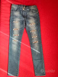 Jeans bambina con inserti in paillettes Sarabanda