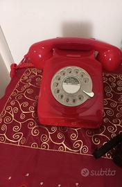 Telefonoyelefono rosso con ghiera numeri