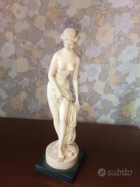 statua