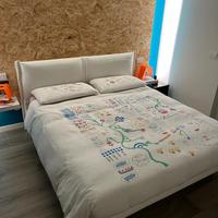 Letto design bianco ecopelle